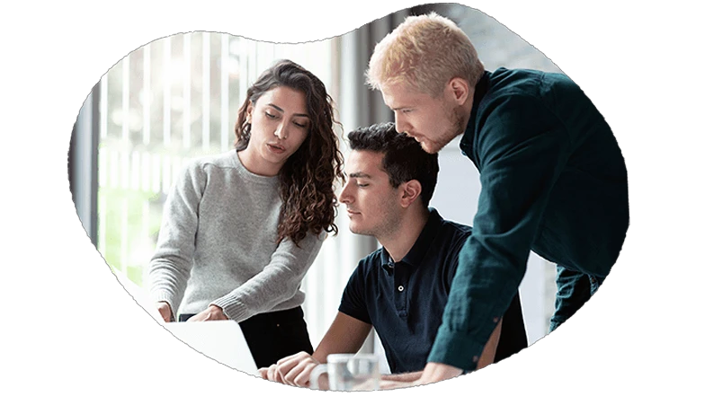 Team in front of computer